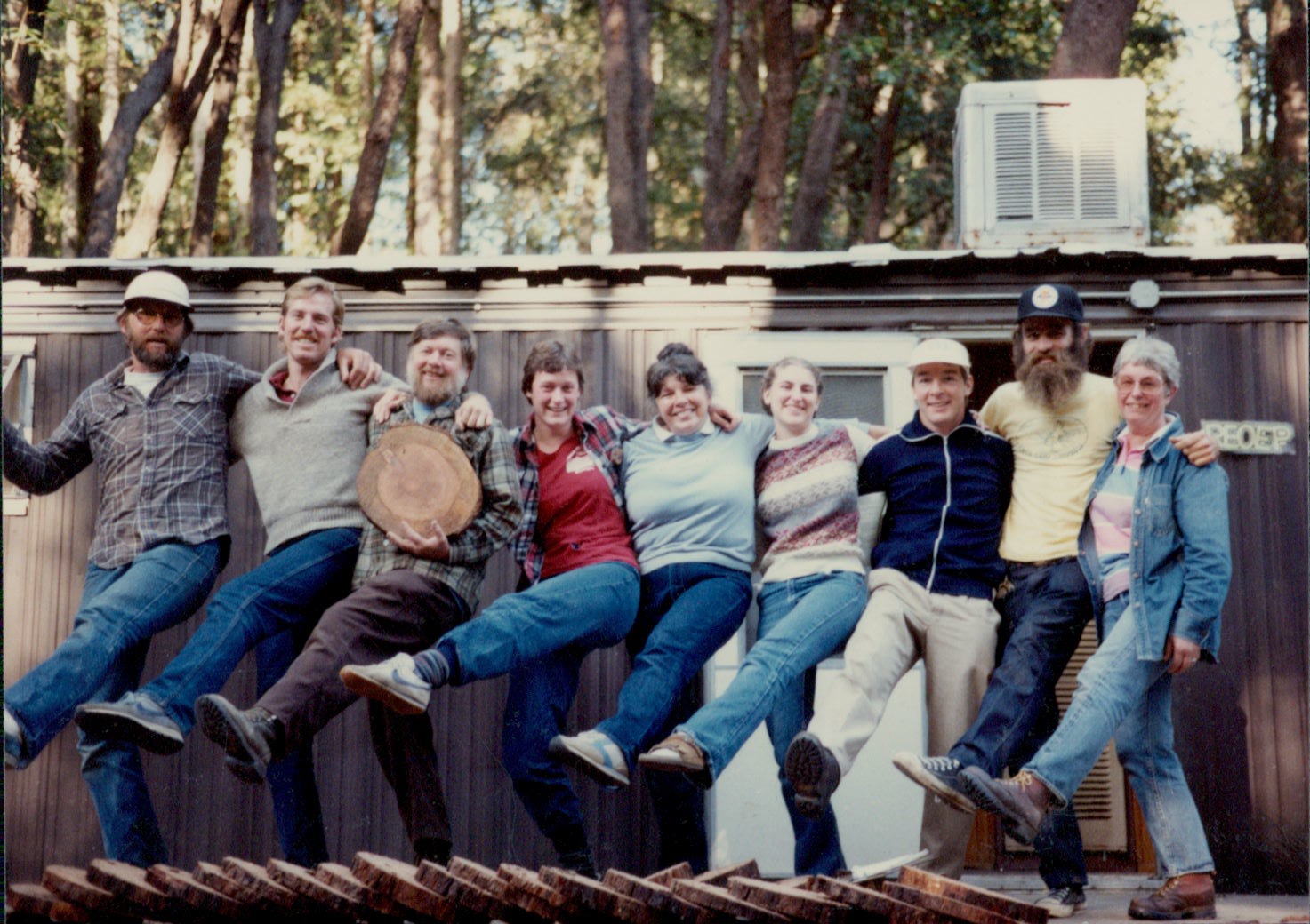 a bunch of people with their legs up