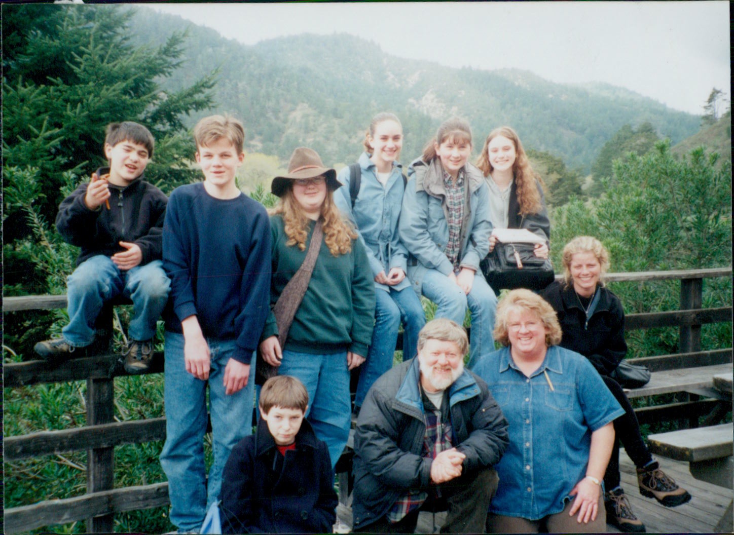 people by a fence