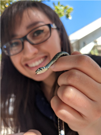 elsie holding a snake