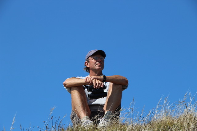 breck birdwatching on a hill